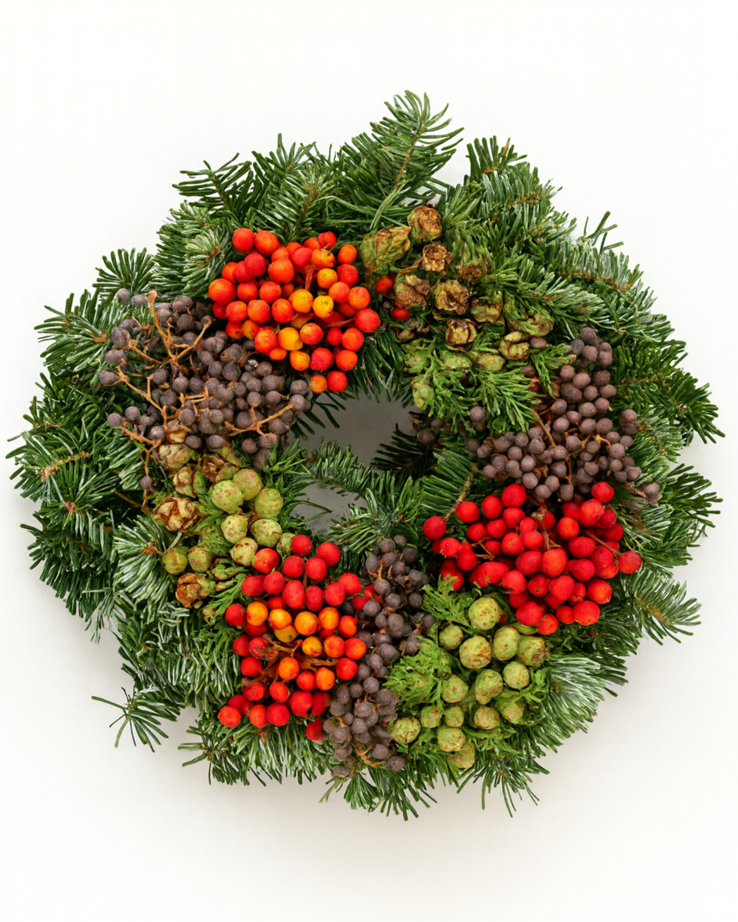 Corona de Navidad natural con frutos y Nobilis